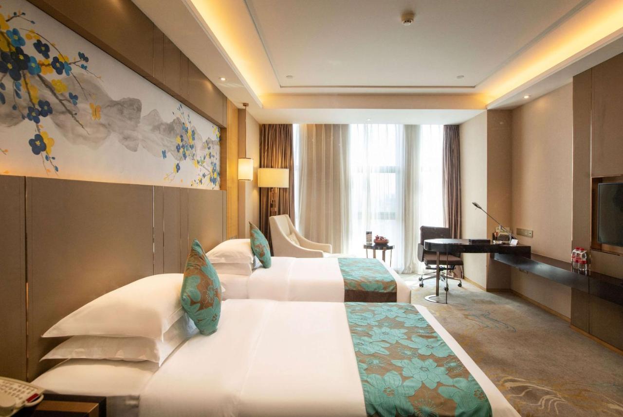 Hotel Ramada Yiyang Taojiang Extérieur photo