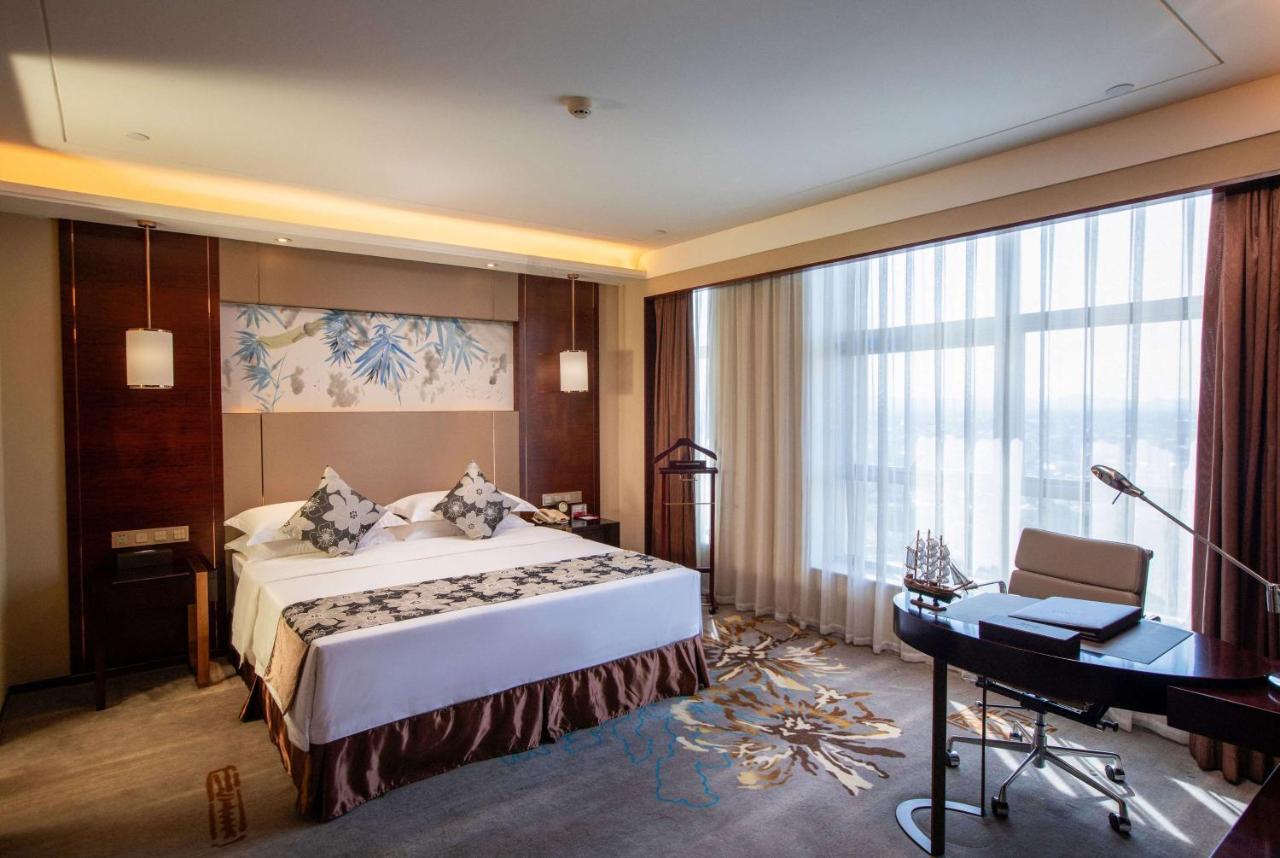 Hotel Ramada Yiyang Taojiang Extérieur photo