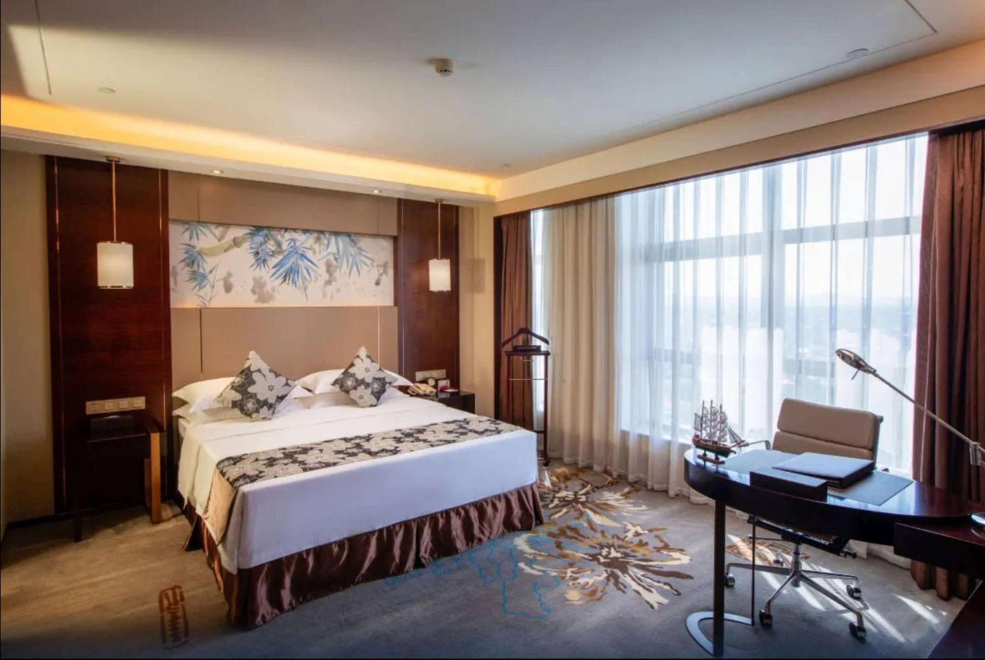 Hotel Ramada Yiyang Taojiang Extérieur photo