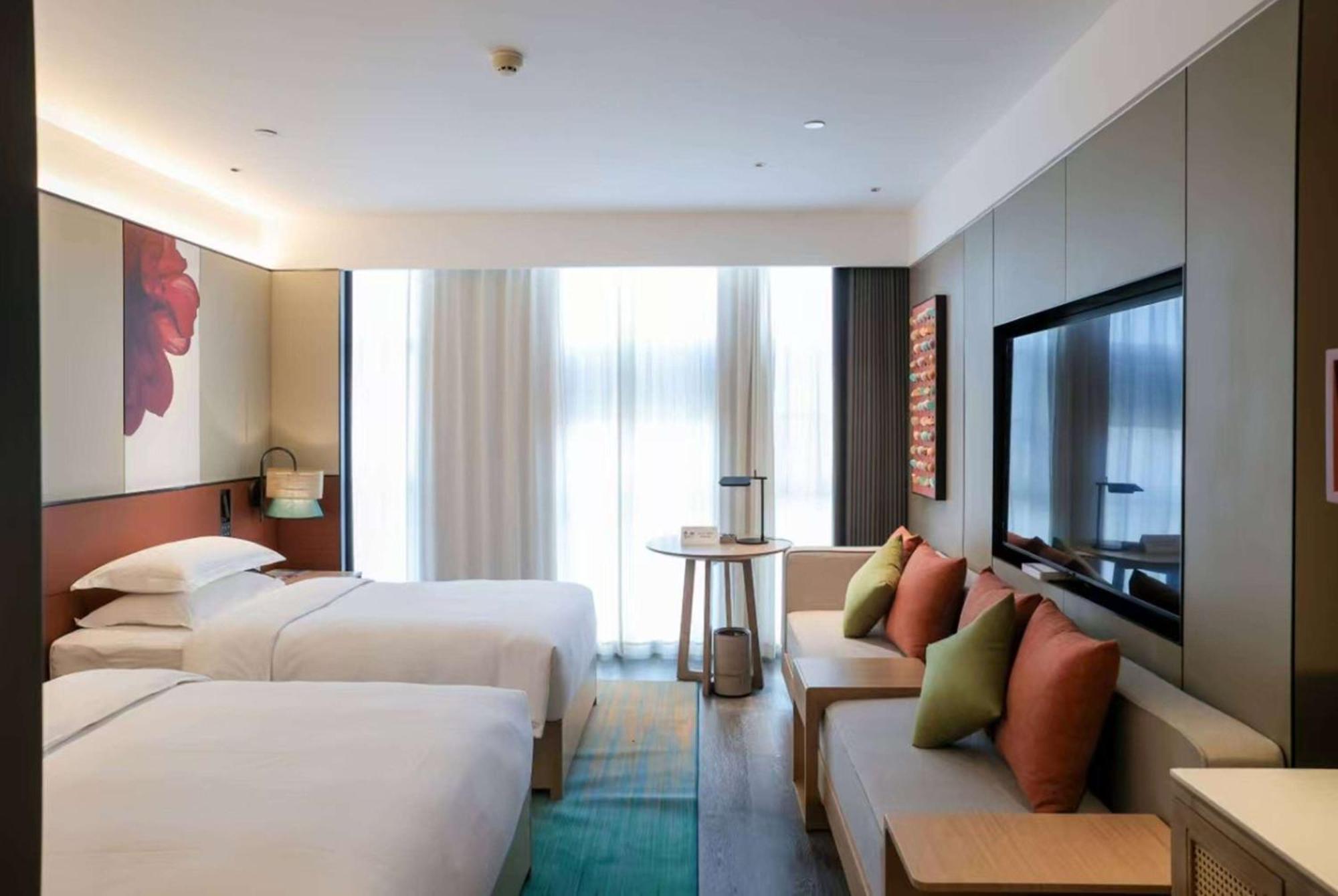 Hotel Ramada Yiyang Taojiang Extérieur photo