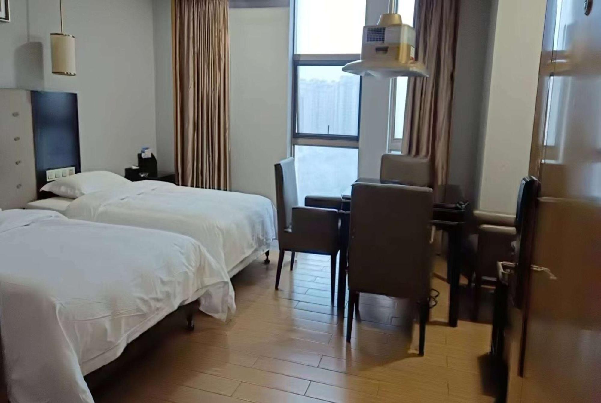 Hotel Ramada Yiyang Taojiang Extérieur photo