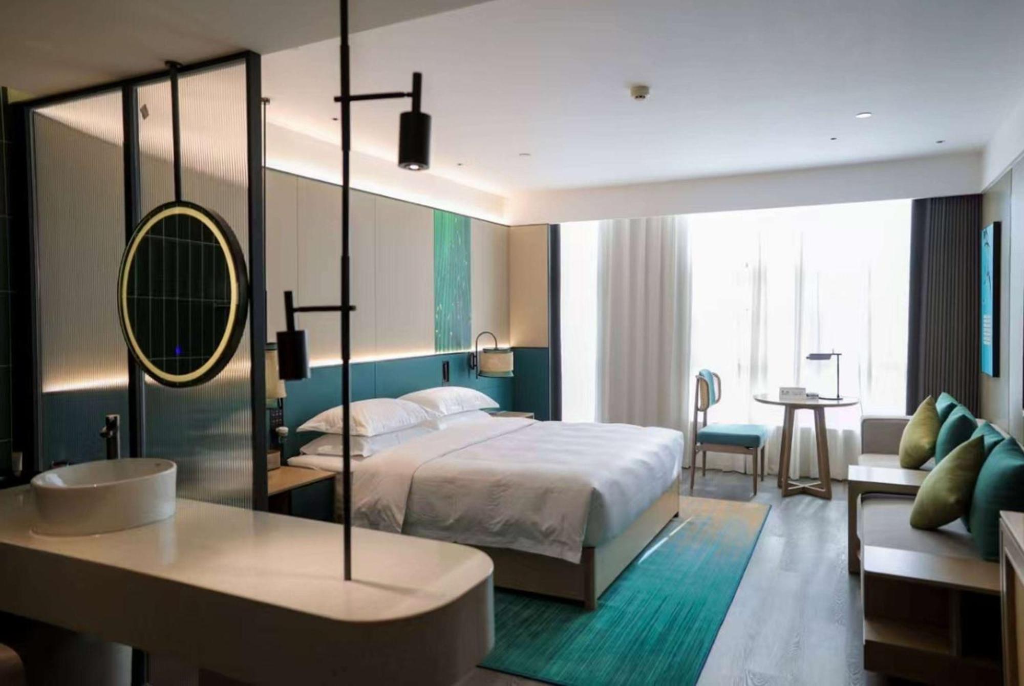 Hotel Ramada Yiyang Taojiang Extérieur photo
