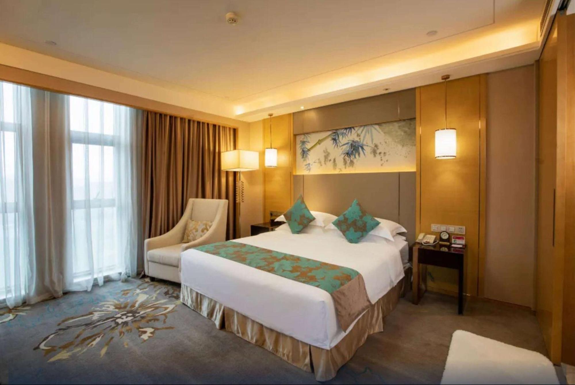Hotel Ramada Yiyang Taojiang Extérieur photo