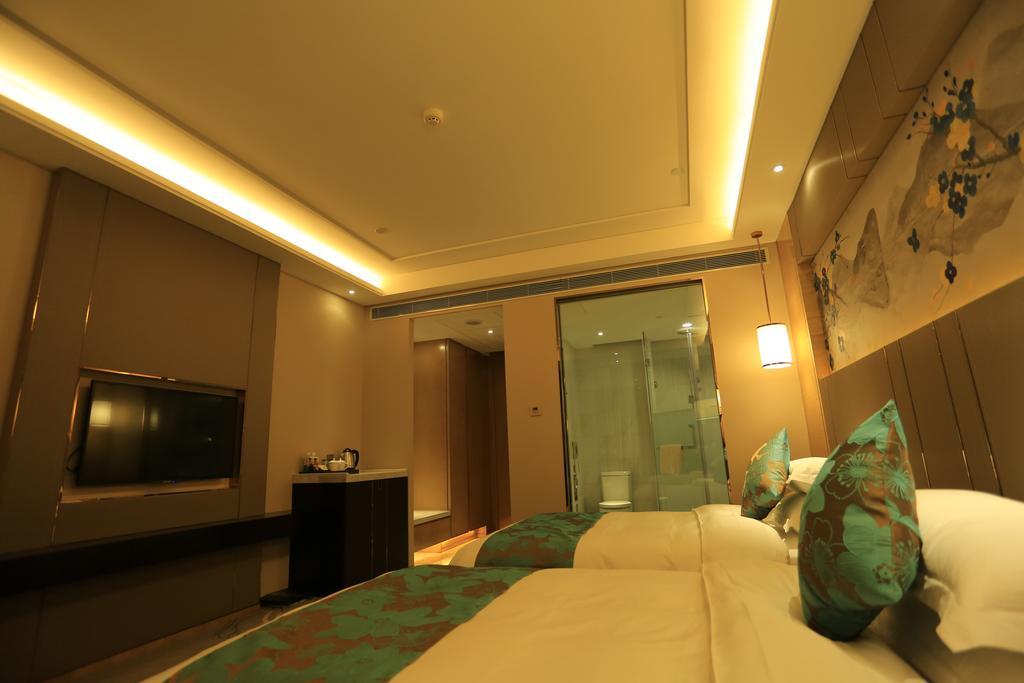 Hotel Ramada Yiyang Taojiang Extérieur photo