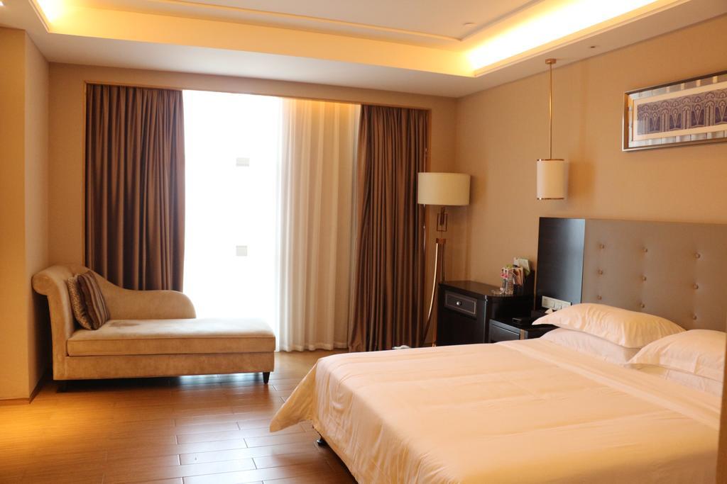 Hotel Ramada Yiyang Taojiang Extérieur photo