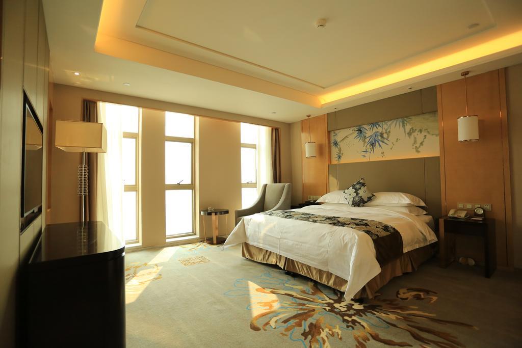 Hotel Ramada Yiyang Taojiang Extérieur photo
