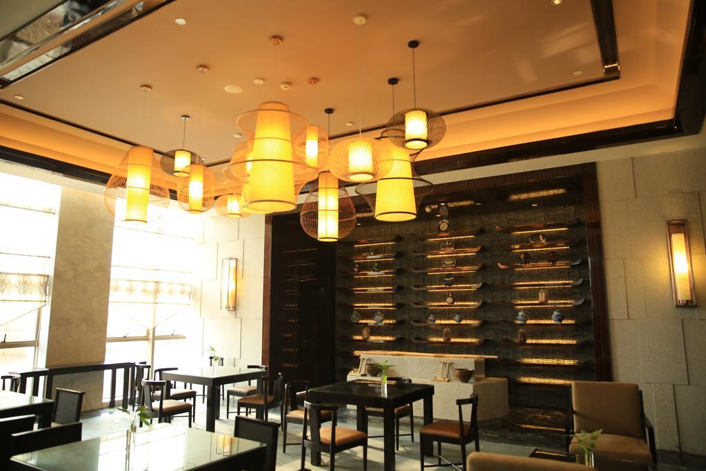 Hotel Ramada Yiyang Taojiang Extérieur photo