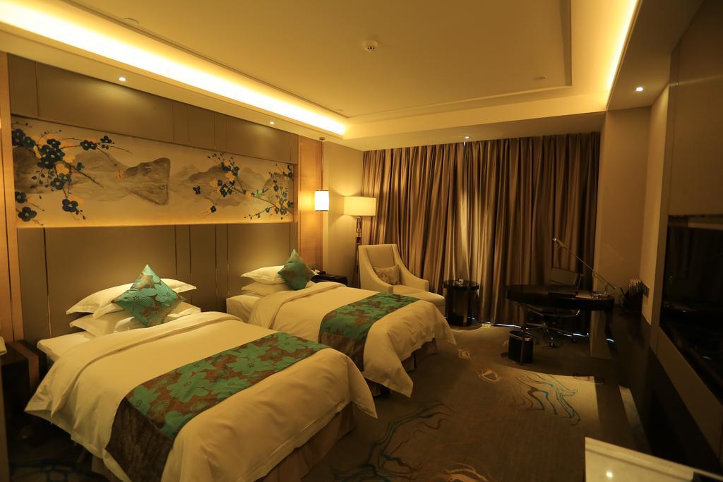 Hotel Ramada Yiyang Taojiang Extérieur photo