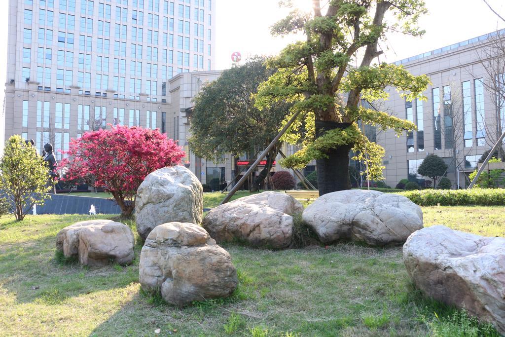 Hotel Ramada Yiyang Taojiang Extérieur photo