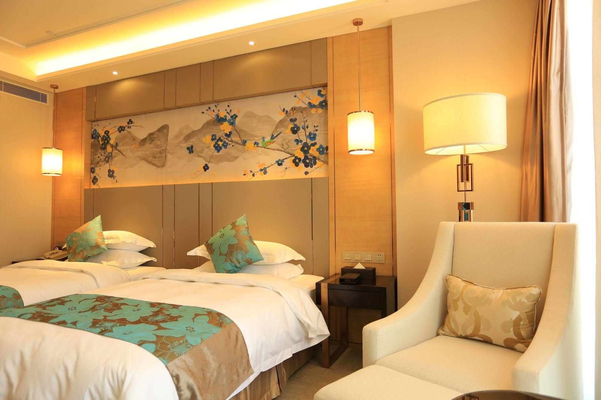 Hotel Ramada Yiyang Taojiang Extérieur photo